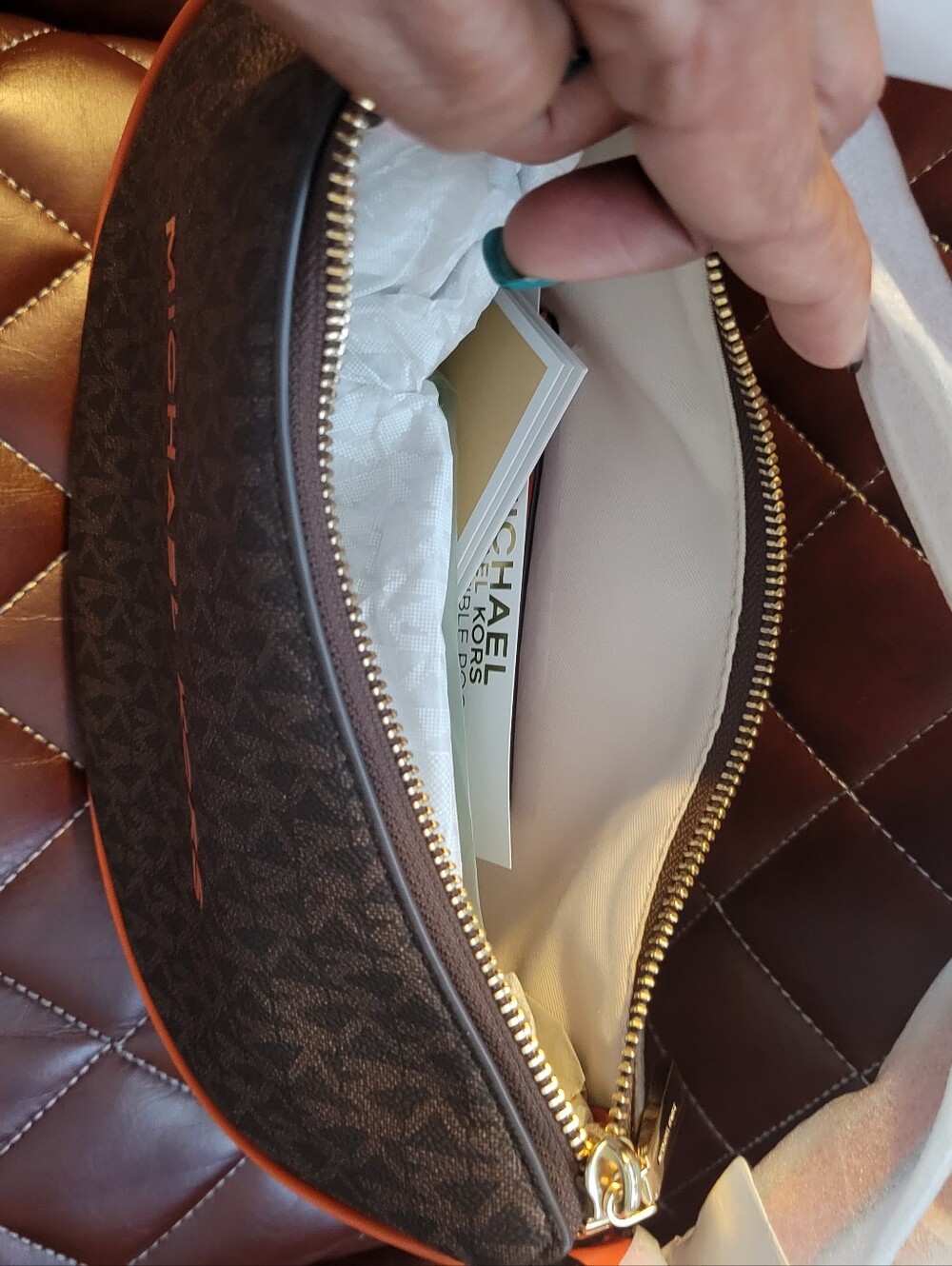 Michael Kors Brown Monogram Toiletry Pouch with Orange Trim/Zip Around Wallet